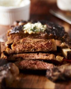 Up close of sliced steak with blackening seasoning.
