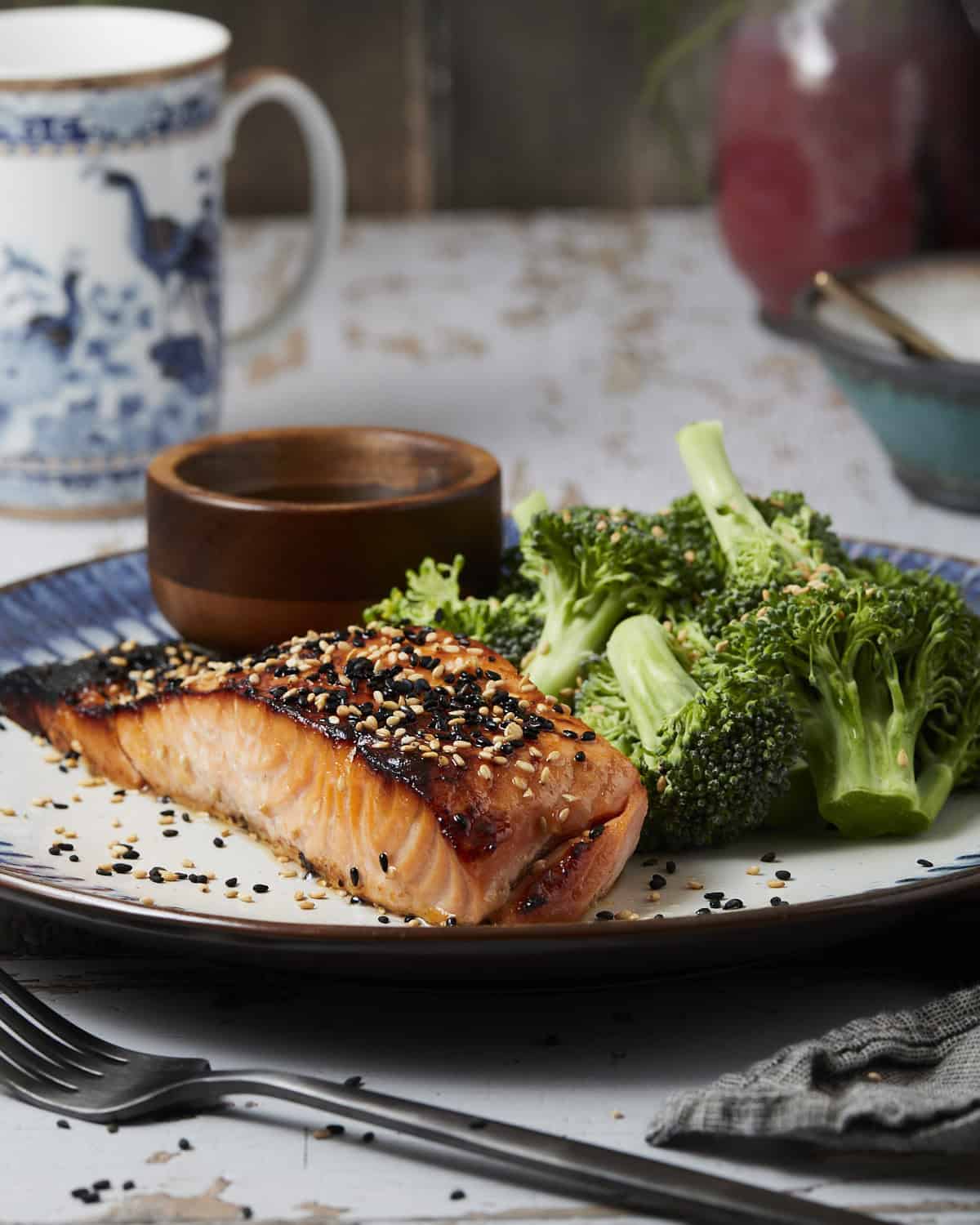 Plated oven baked miso salmon with broccoli.