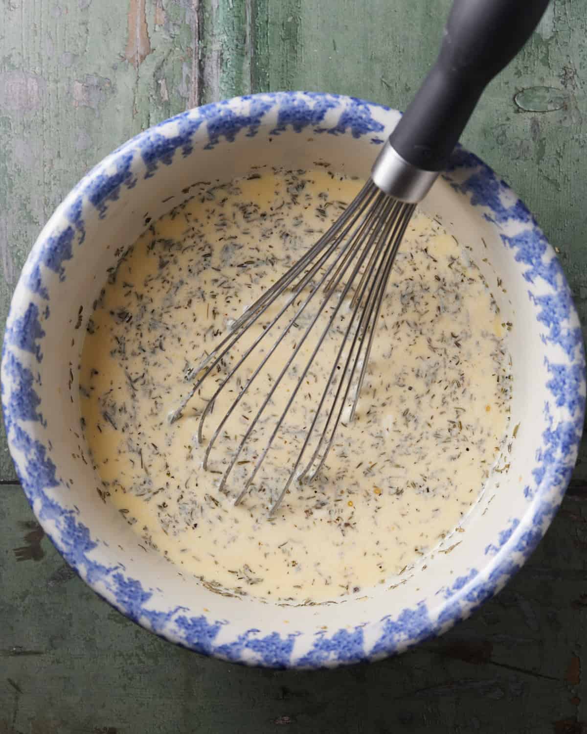Making custard for the croissant bake.