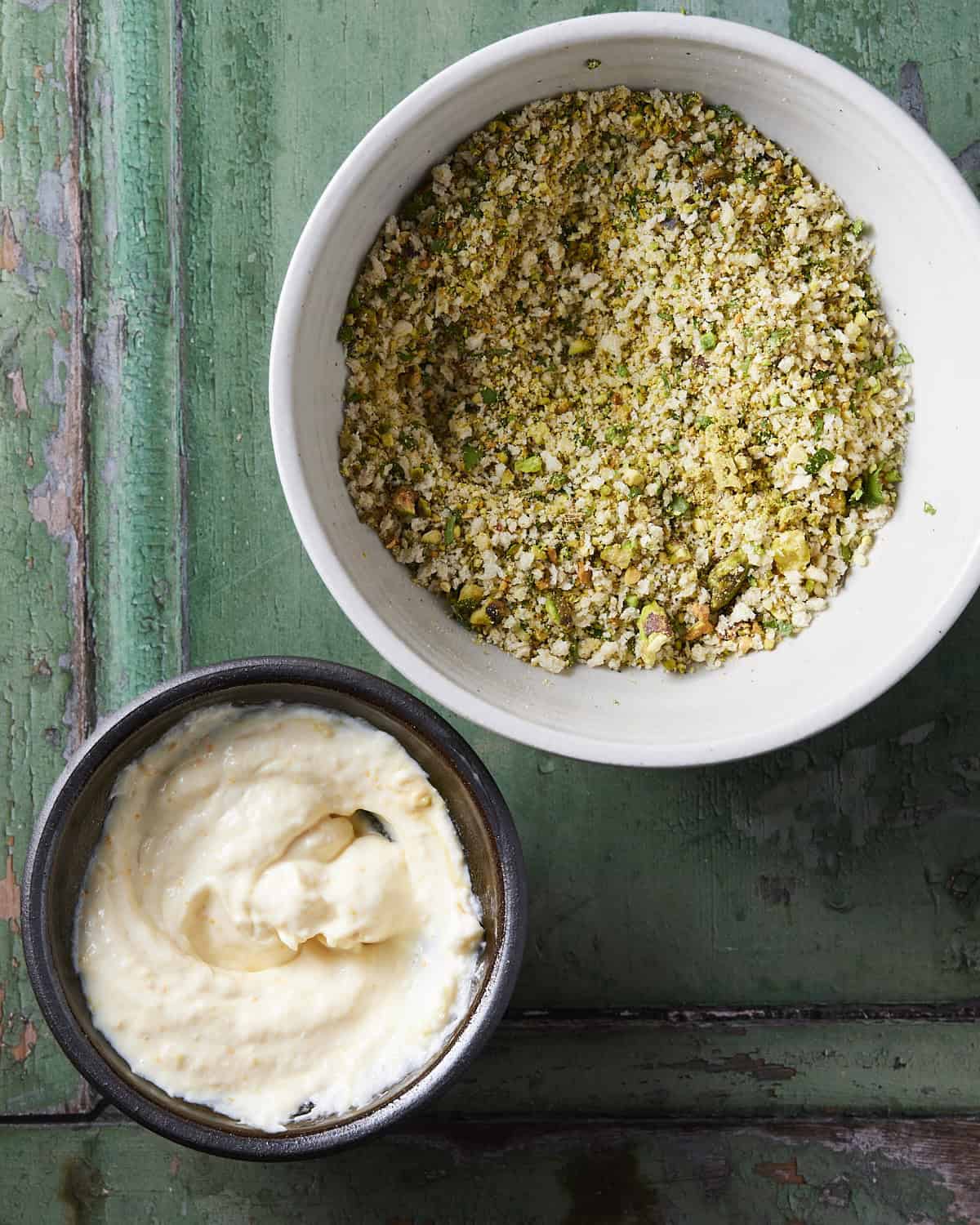 Mayo sauce and pistachio breadcrumbs mixed and ready to coat salmon.