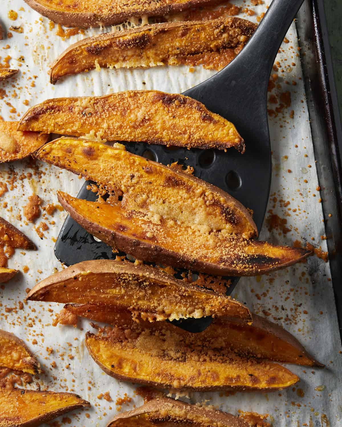 Up close of baked sweet potato wedges 