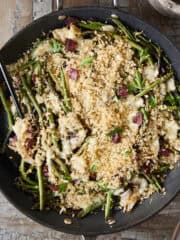 A Ruben style skillet green beans with a caraway breadcrumb topping.